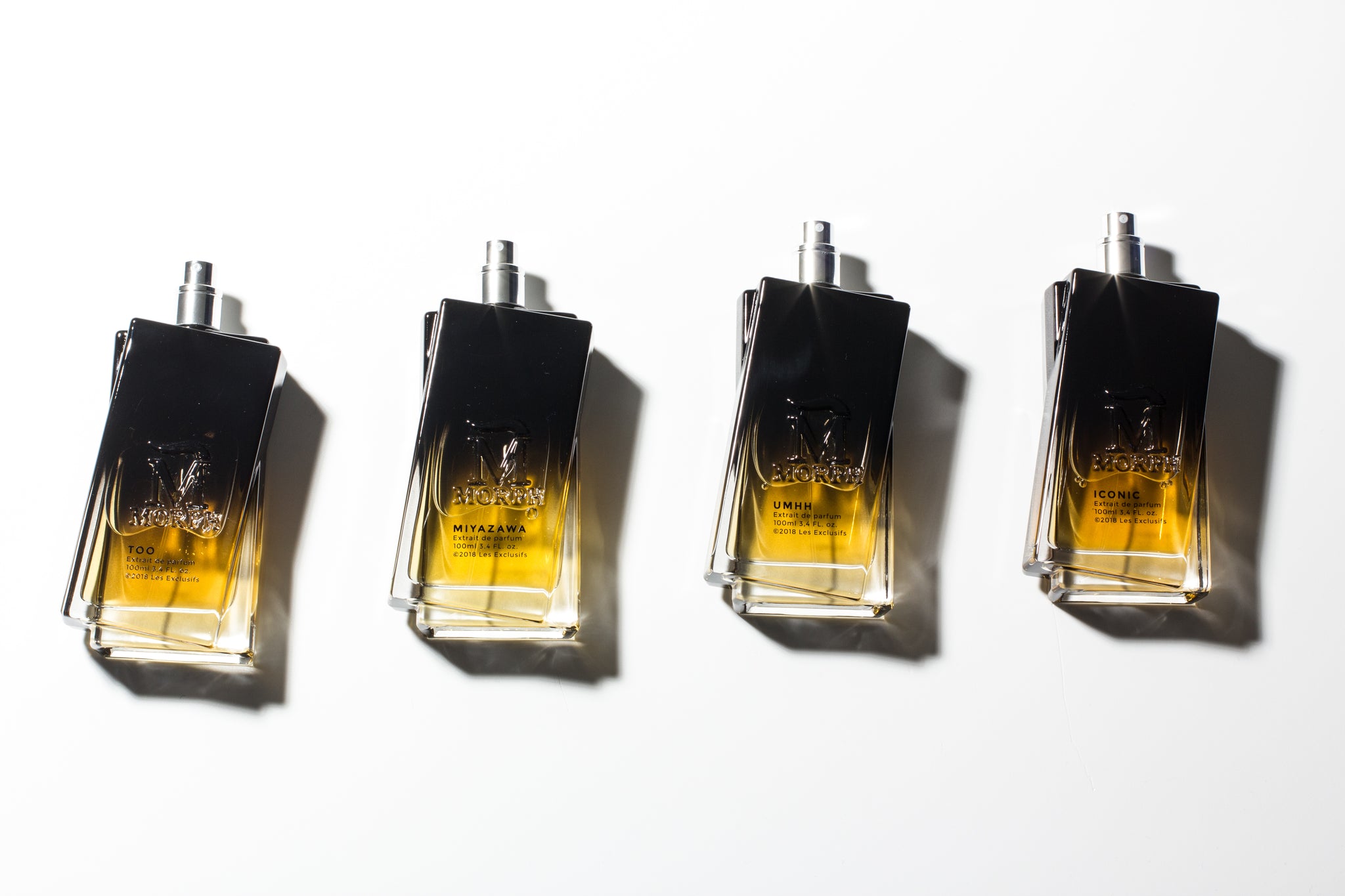 rij met morph parfumflessen uit de exclusif collectie